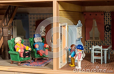 Playmobile toy people illustrating social distancing to avoid passing on the virus to older people