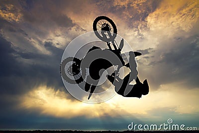 Freestyle motorcross at sunset Stock Photo