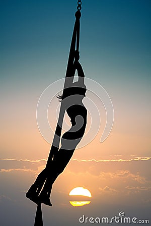 Girl aerial contortion Stock Photo