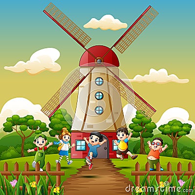 Happy kids playing in front of windmill building background Vector Illustration