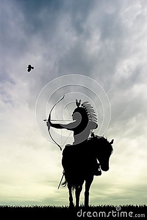 Indian hunter on horseback Stock Photo