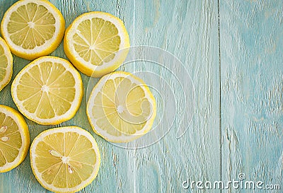 Illustration. Lemons on a wooden blue background. Stock Photo