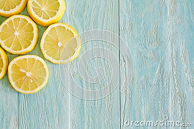 Illustration. Lemons on a wooden blue background. Stock Photo