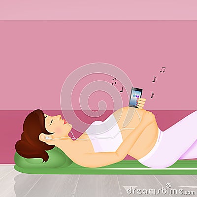 Pregnant woman listens to music Stock Photo