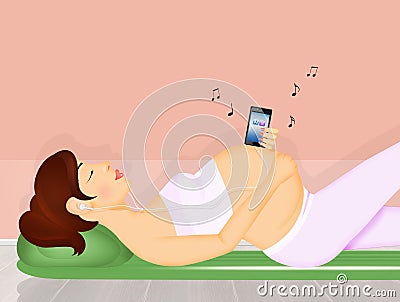 Pregnant woman listens to music Stock Photo