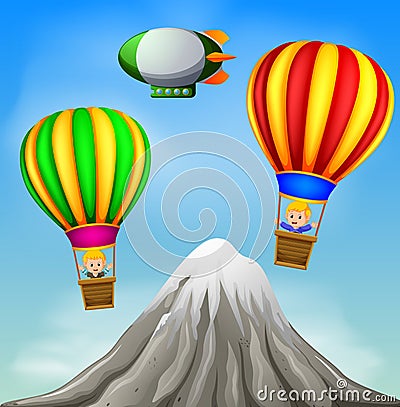 Two hot air balloons flying with happy boys and mountain scene Vector Illustration
