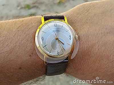 Vintage Vostok russian mechanical watch on wrist Editorial Stock Photo