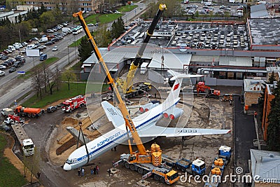 Ilyushin IL-62M RA-86492 putting on a plinth with kranes at Sheremetyevo international airport. Editorial Stock Photo