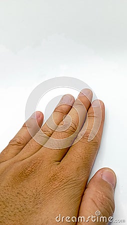 Image of an adult male& hand with well-maintained and neatly trimmed fingernails, captured up close. Stock Photo