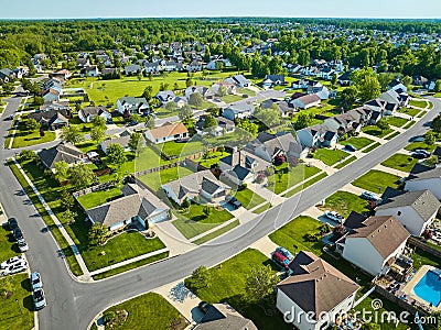 Aerial neighborhood with bright green summer lawns Stock Photo