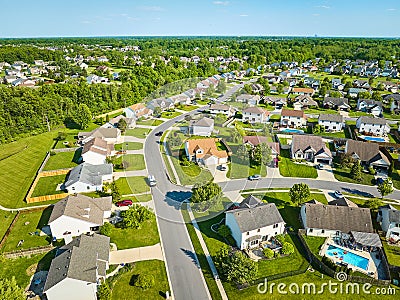 Aerial neighborhood with pools in yards and cars in driveways Stock Photo