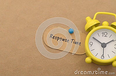 an alarm clock and a note labeled 