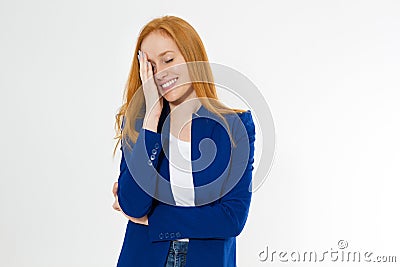 Image of attractive stylish red hair woman in blue style suit making facepalm, holding hand on eye and smiling, coming to terms Stock Photo