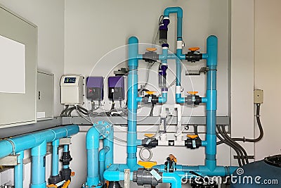 Image background of inside mechanical room of pipeline system for saltwater swimming pool Stock Photo