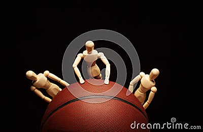 Image of basketball wooden figure dark background Stock Photo