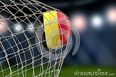 Belgian soccerball in net Stock Photo