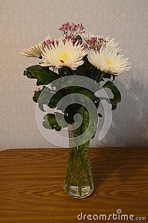 Bouguet of white chrysanthemums on the table Stock Photo