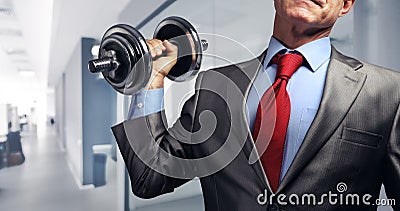 Image of businessman in suit raising dumbbell. Tax burden concept Stock Photo