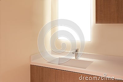 Elegant Wooden Bathroom with White Laminated Sink and Mirror Stock Photo