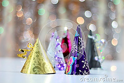 Celebrating New Years with colorful party hats Stock Photo