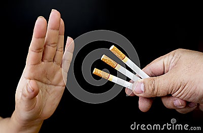 Image of cigarette in hand, Stop smoking concept, World No Tobacco Day ,Smoking does not hurt you alone It also hurts the people a Stock Photo
