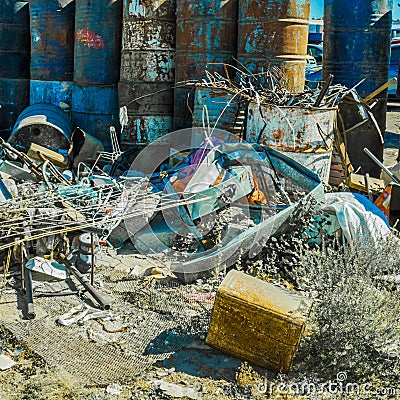 Image of colored oil barrels with garbage Stock Photo