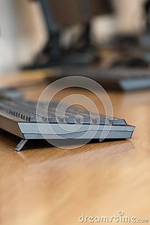 Image of computer keyboards on the table in line Stock Photo