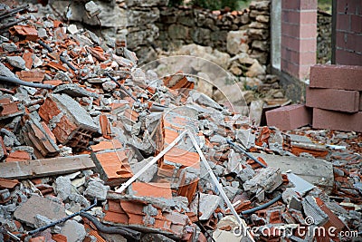 Image of debris from a demolition, destroyed pieces of brick. Stock Photo