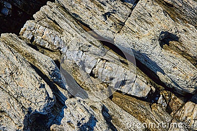 Detail of rocks from above with large section of mineral quartz vein Stock Photo