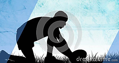 Image of diagonal blue stripe moving over silhouetted male rugby player placing ball on grass Stock Photo