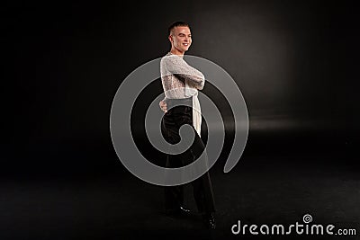 Image of emotional man in white shirt dancing Stock Photo