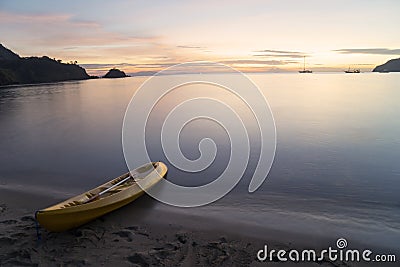 Empty canoe on the beach Stock Photo