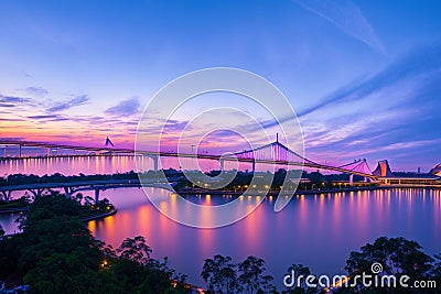 An evening shot at Putrajaya with colorful led on Wawasan bridge made with Generative AI Stock Photo