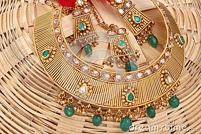 A image of a female jewelry chain with stones.For girls and women matching earrings, mangtika and necklace. Stock Photo