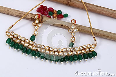 A image of a female jewelry with stones.For girls and women matching earrings and necklace. Stock Photo