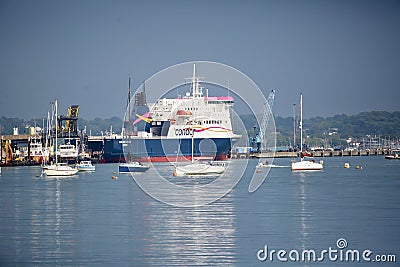 Ferry and sailing boats in Poole Harbour Editorial Stock Photo