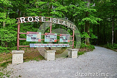 Forest, woodland, trail marker, wooden signs, Rose Island, information stand outside woods, trail Editorial Stock Photo