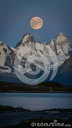 Image Full moon shines brightly over Patagonia, Argentina Stock Photo