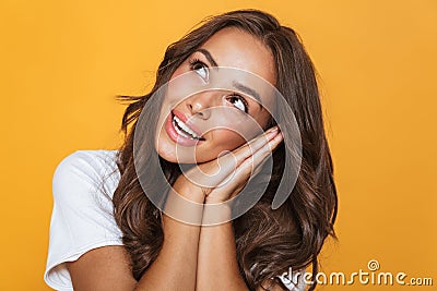 Image of gorgeous woman 20s with long hair smiling and looking a Stock Photo