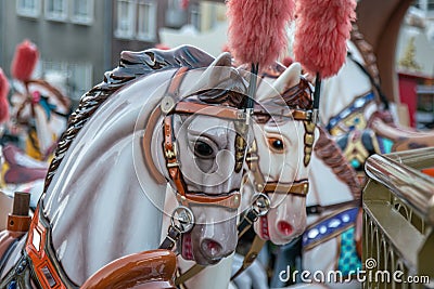 A Group of Carousel Horses on a Fun Fair Ride Stock Photo