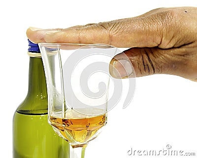 Stop drinking New Year`s resolution with hand over glass Stock Photo