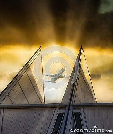An image of a jet plane flying over the Untied States Air Force Academy Chapel - USAF Stock Photo