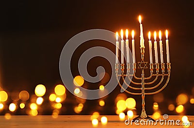 image of jewish holiday Hanukkah background with menorah & x28;traditional candelabra& x29; and candles. Stock Photo