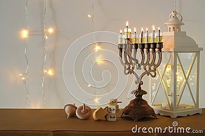 image of jewish holiday Hanukkah background with traditional spinnig top, menorah & x28;traditional candelabra& x29; Stock Photo