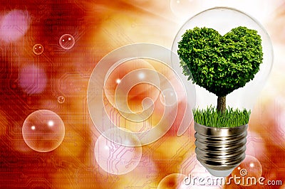 Image with a light bulb inside which a tree is symbolically placed, and the crown of the tree looking like a heart Stock Photo