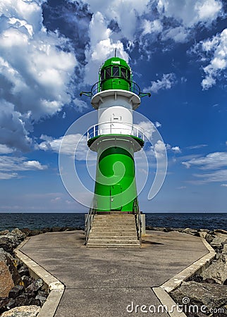 Image of the lighthouse of Warnemunde on the Baltic Sea at the harbor entrance, Germany Stock Photo