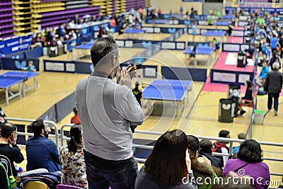 Man applauding athletes in table tennis competitions Editorial Stock Photo