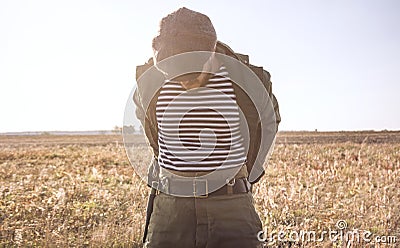 Image of a man putting on camouflage before hunting. Duck hunting season Stock Photo