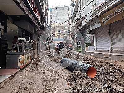 Busy atmosphere during the sewer excavation (Press Photograph) Editorial Stock Photo