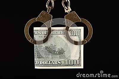 Image of money handcuffs dark background Stock Photo